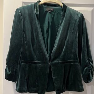 Dark green velvet blazer.